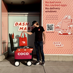 Loading_Coco_with_DoorDash_Bag.jpg